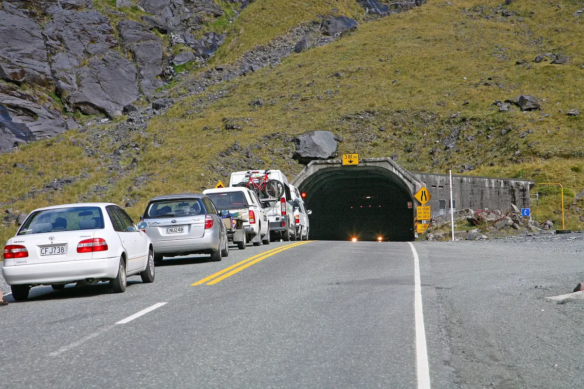Cars waiting at the entrance of the Homer Tunnel
