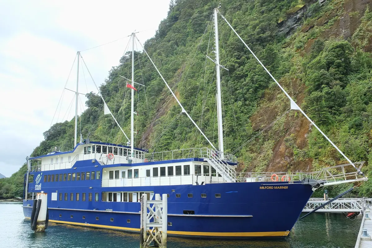 An overnight cruise ship moored in Milford Sound